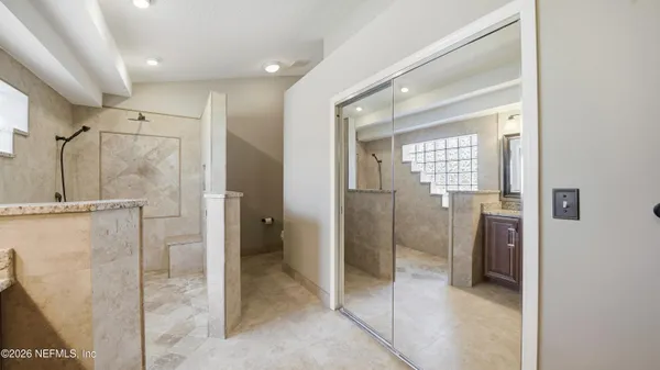 a view of a house with backyard and porch