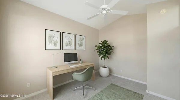 an empty room with a ceiling fan