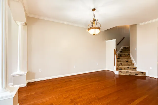 a view of entryway with wooden floor