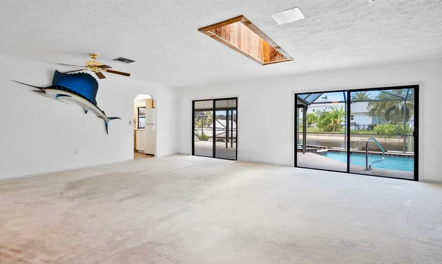 a view of empty room with front door