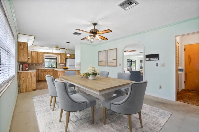 a view of a kitchen with furniture and cabinet