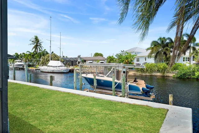 a view of a lake with a sitting area