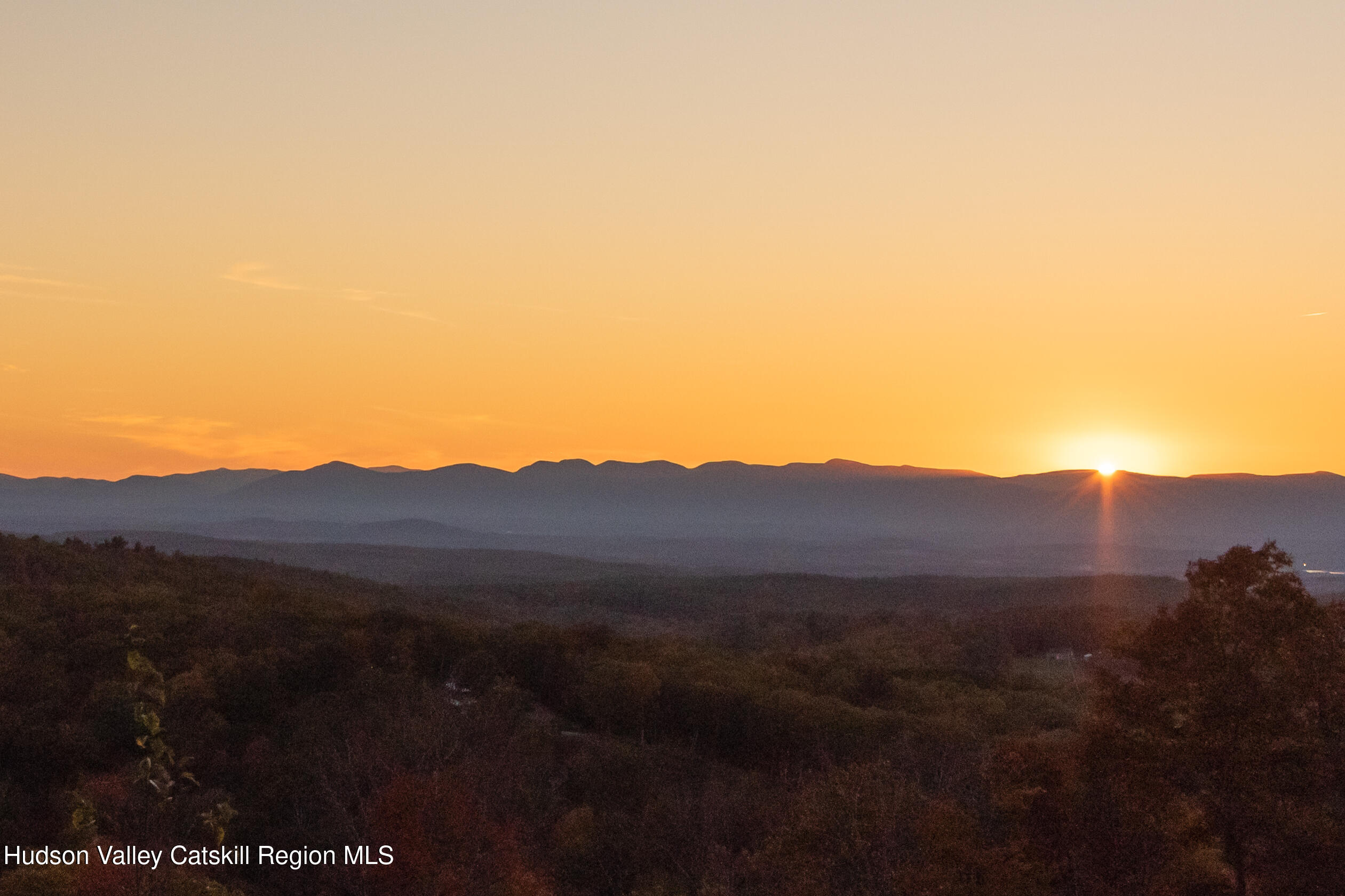 190 Mallory Road Chatham, NY 12037 - Photo 2 of 26 a view of mountains in the middle of a field