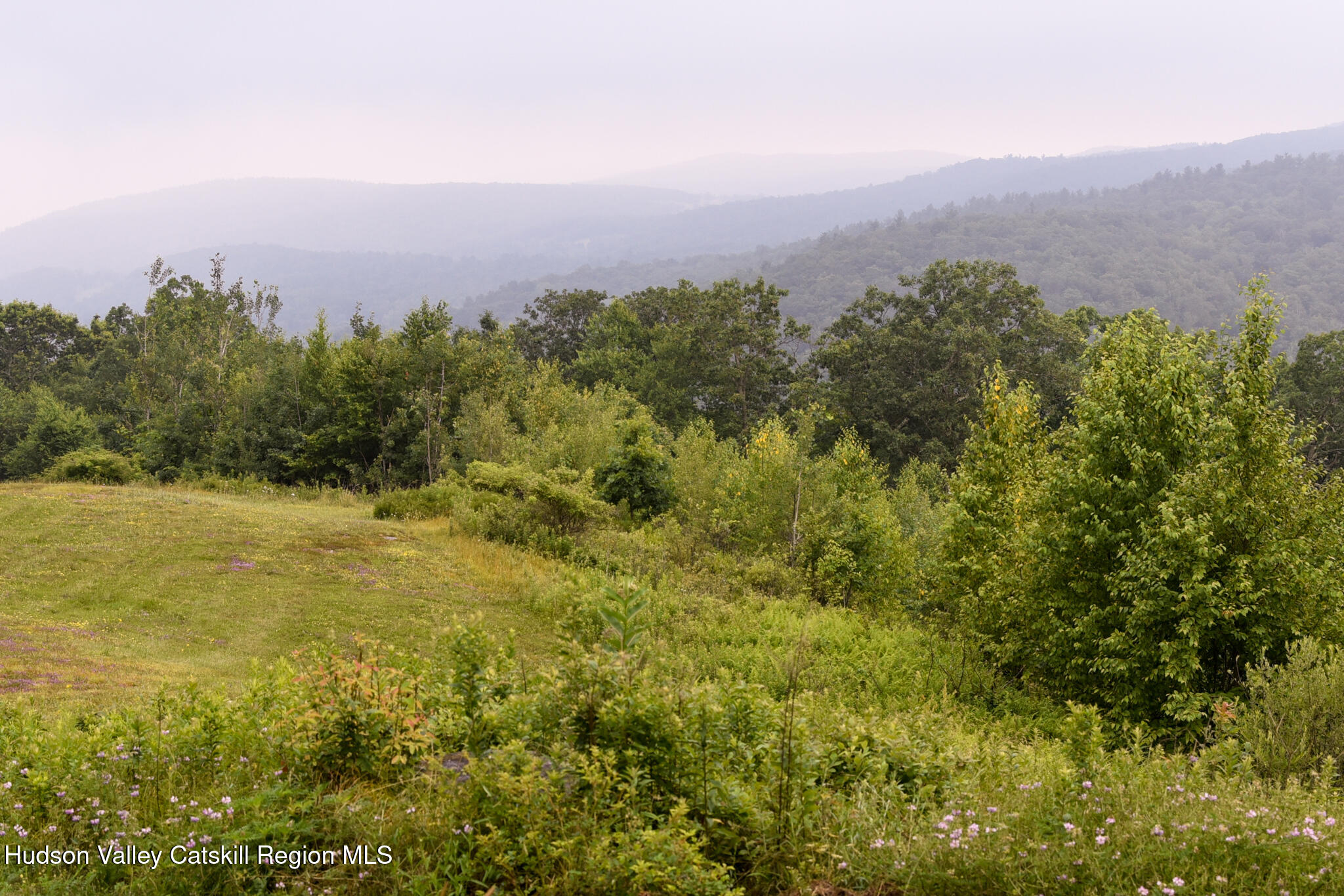 190 Mallory Road Chatham, NY 12037 - Photo 22 of 26 a view of a city and mountains in the background