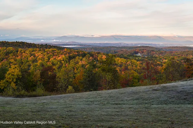 a view of lake and mountain