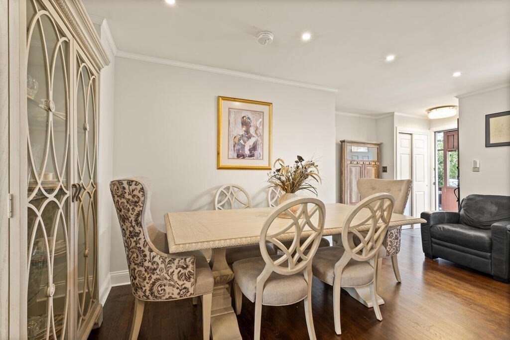 36 Violet Street Boston, MA 02126 - Photo 12 of 35 a view of a dining room with furniture and wooden floor