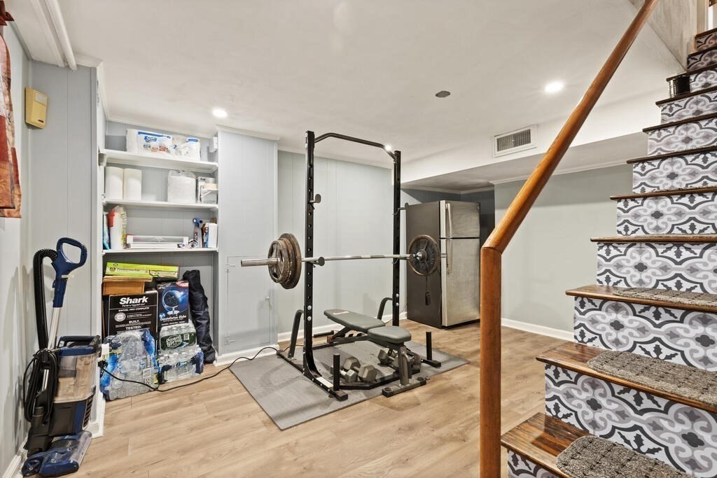 36 Violet Street Boston, MA 02126 - Photo 22 of 35 a view of a room with gym equipment