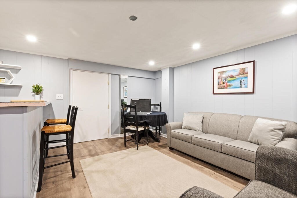 36 Violet Street Boston, MA 02126 - Photo 23 of 35 a living room with furniture and a couch