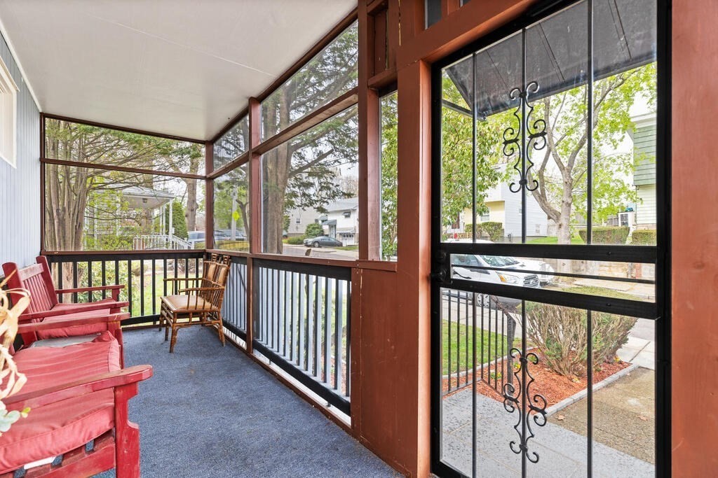 36 Violet Street Boston, MA 02126 - Photo 5 of 35 a view of a room with wooden floor and furniture