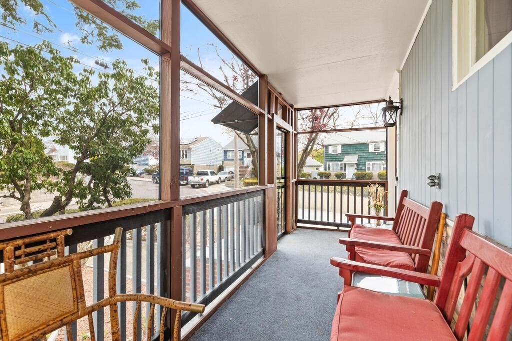 36 Violet Street Boston, MA 02126 - Photo 6 of 35 a view of a two chairs in the balcony