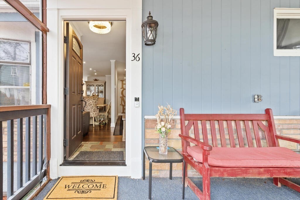 36 Violet Street Boston, MA 02126 - Photo 7 of 35 a bedroom with a bed and glass window