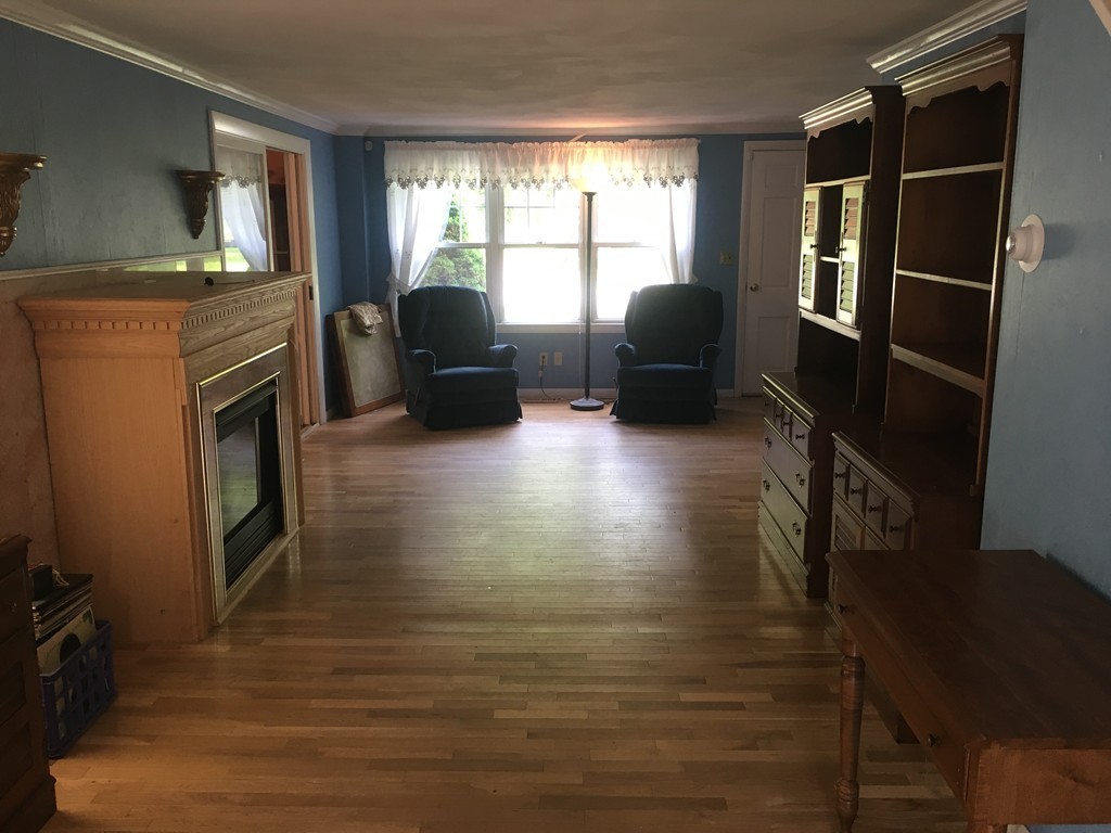20 Arnold Road Douglas, MA 01516 - Photo 7 of 21 a living room with furniture window and wooden floor