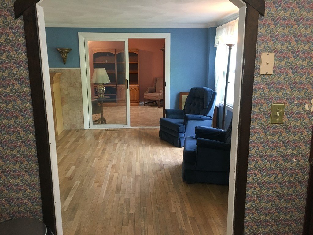 20 Arnold Road Douglas, MA 01516 - Photo 9 of 21 a living room with furniture and a flat screen tv