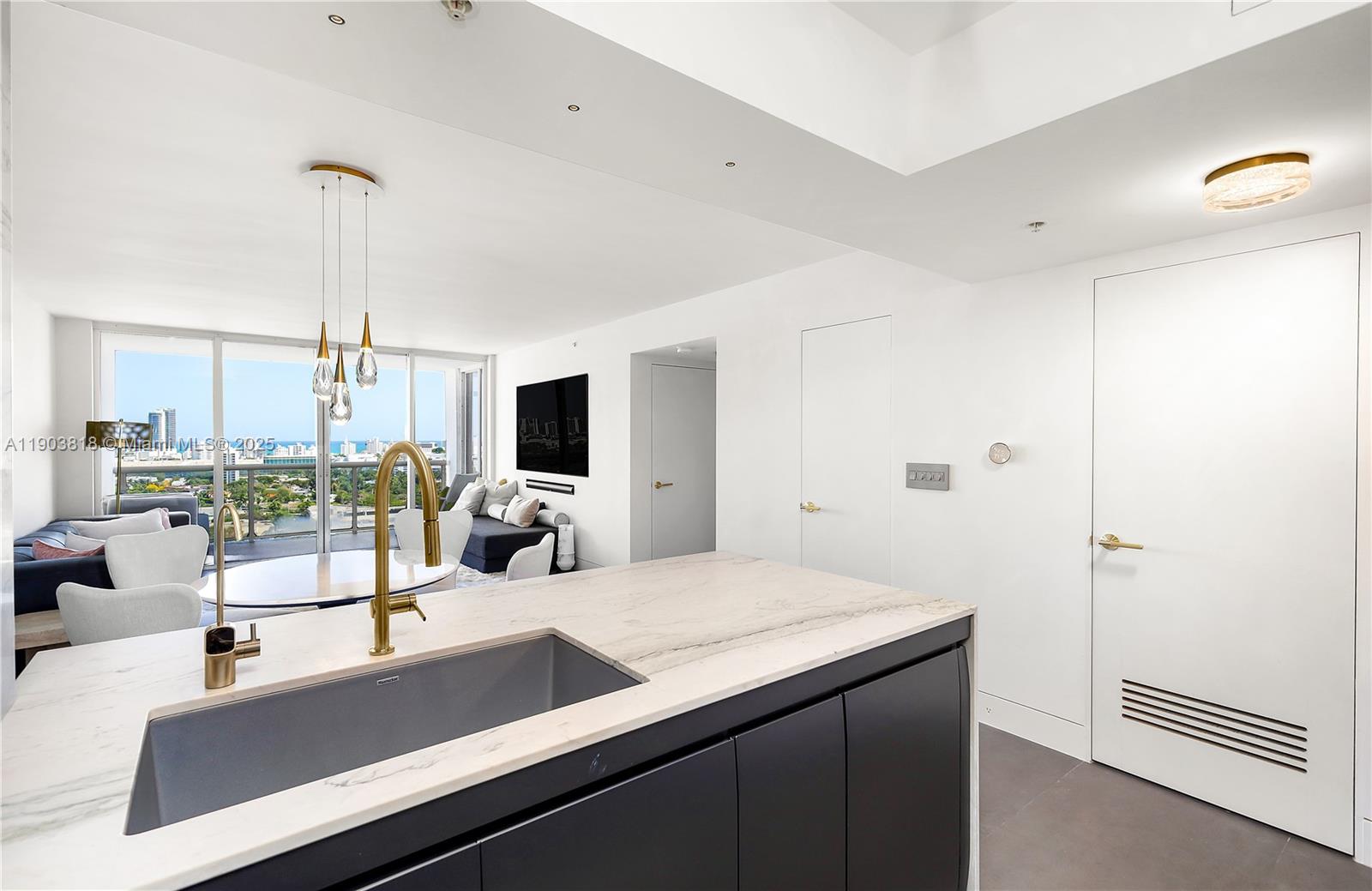 1800 Sunset Harbour Drive, Unit 2105 Miami Beach, FL 33139 - Photo 12 of 52 a view of living room with furniture and floor to ceiling window
