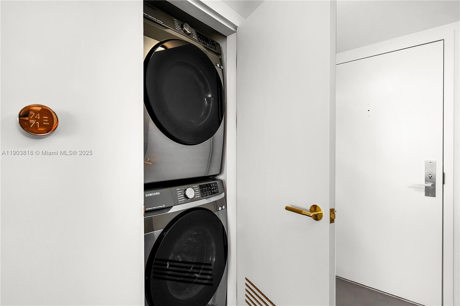 1800 Sunset Harbour Drive, Unit 2105 Miami Beach, FL 33139 - Photo 26 of 52 a view of storage and utility room with washer and dryer