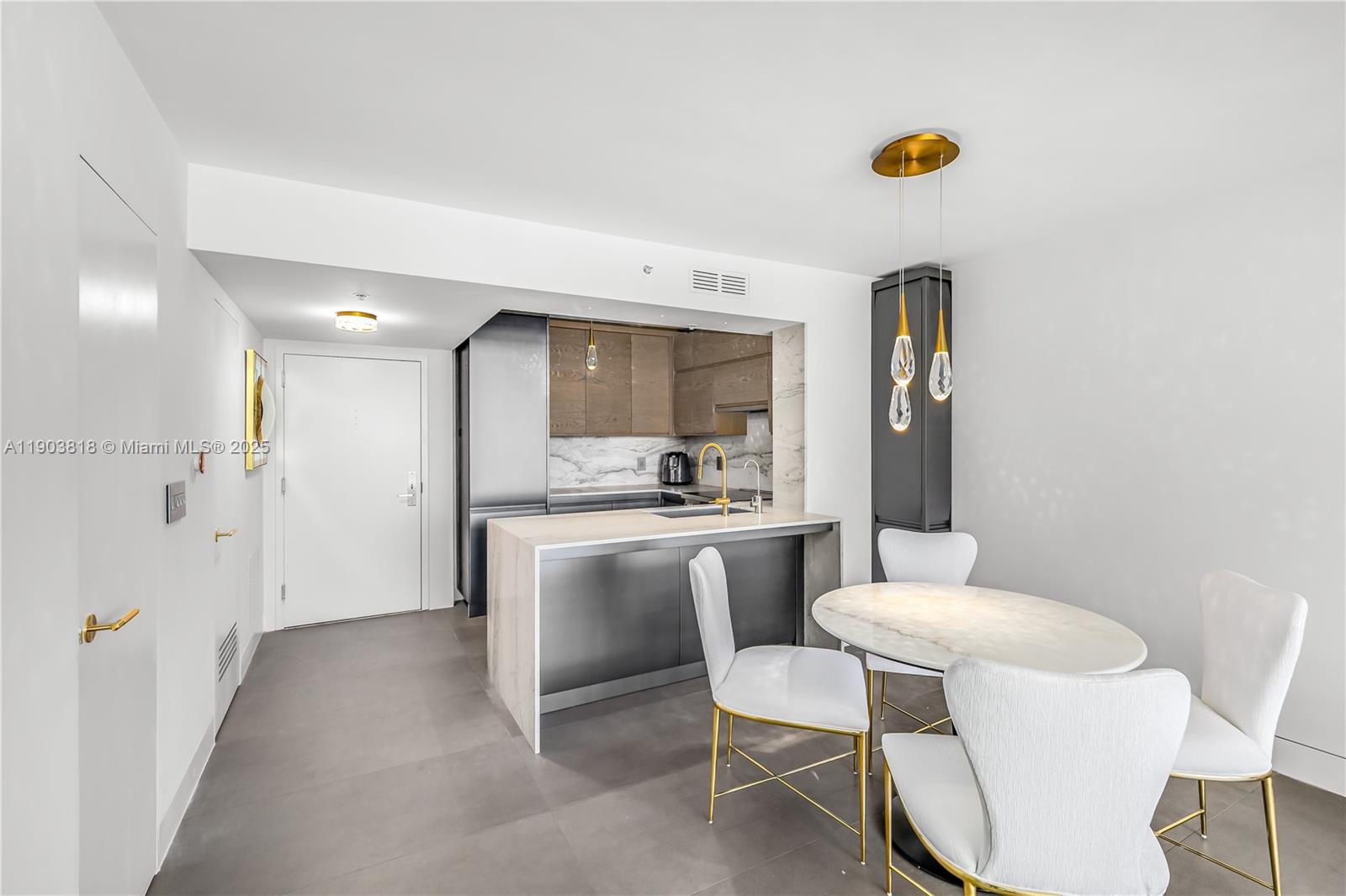 1800 Sunset Harbour Drive, Unit 2105 Miami Beach, FL 33139 - Photo 30 of 52 a bathroom with a sink mirror vanity and toilet