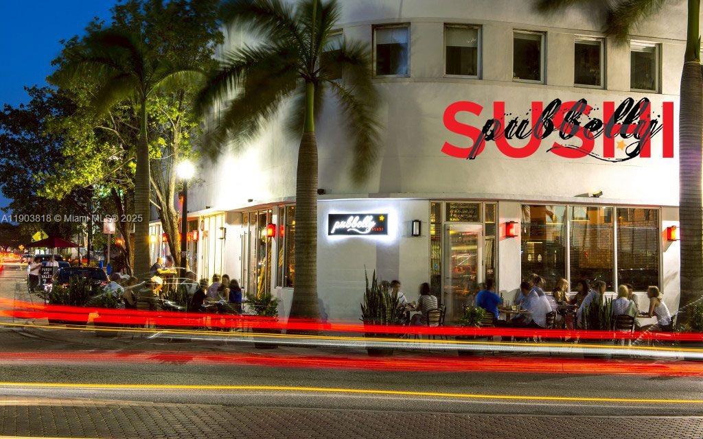 1800 Sunset Harbour Drive, Unit 2105 Miami Beach, FL 33139 - Photo 43 of 52 a street sign on the side of building