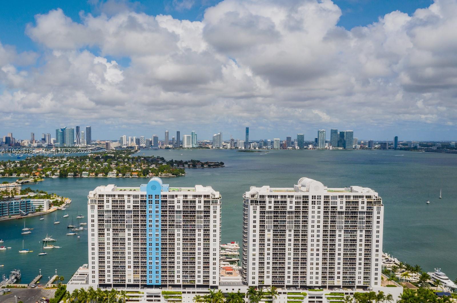 1800 Sunset Harbour Drive, Unit 2105 Miami Beach, FL 33139 - Photo 52 of 52 a view of a lake with tall building
