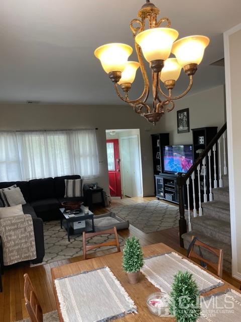 83 Brandywine Road Fords, NJ 08863 - Photo 14 of 31 a living room with fireplace furniture and a chandelier
