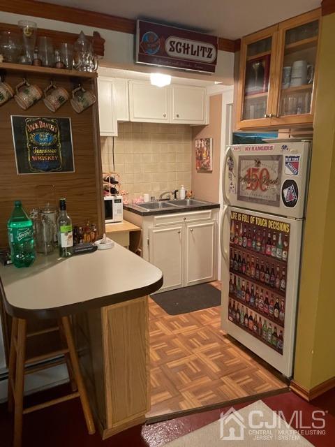 83 Brandywine Road Fords, NJ 08863 - Photo 21 of 31 a kitchen with kitchen island a stove a sink and a refrigerator