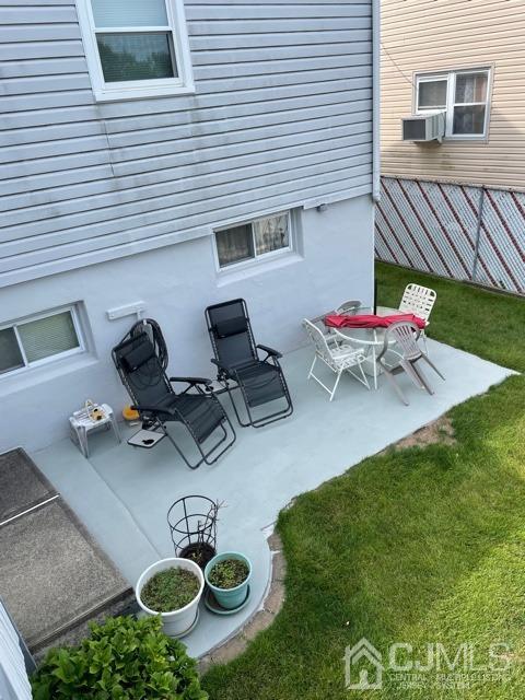 83 Brandywine Road Fords, NJ 08863 - Photo 10 of 31 a backyard of a house with table and chairs