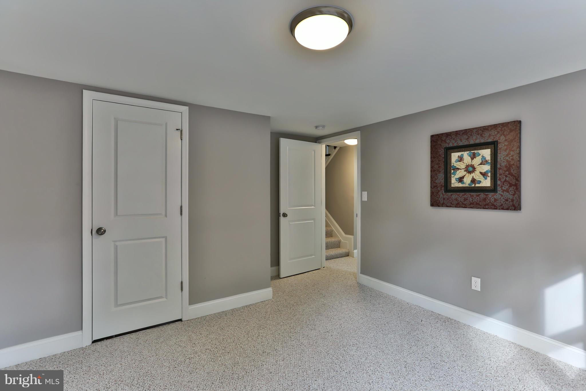 203 Hollen Road Baltimore, MD 21212 - Photo 23 of 30 an empty room with windows