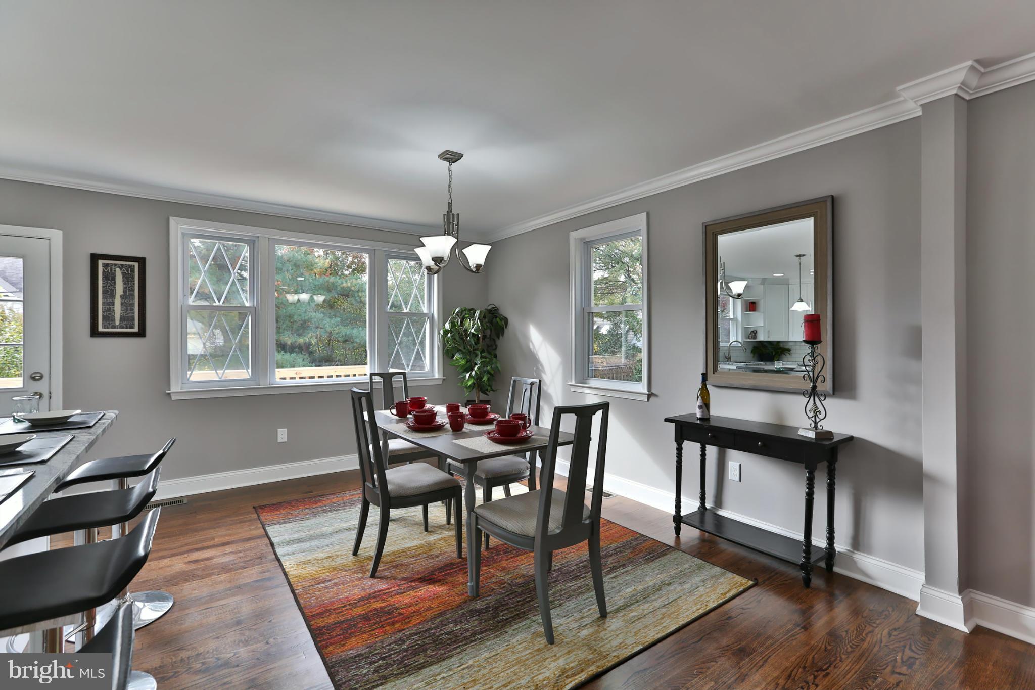 203 Hollen Road Baltimore, MD 21212 - Photo 8 of 30 a view of a dining room with furniture window and wooden floor