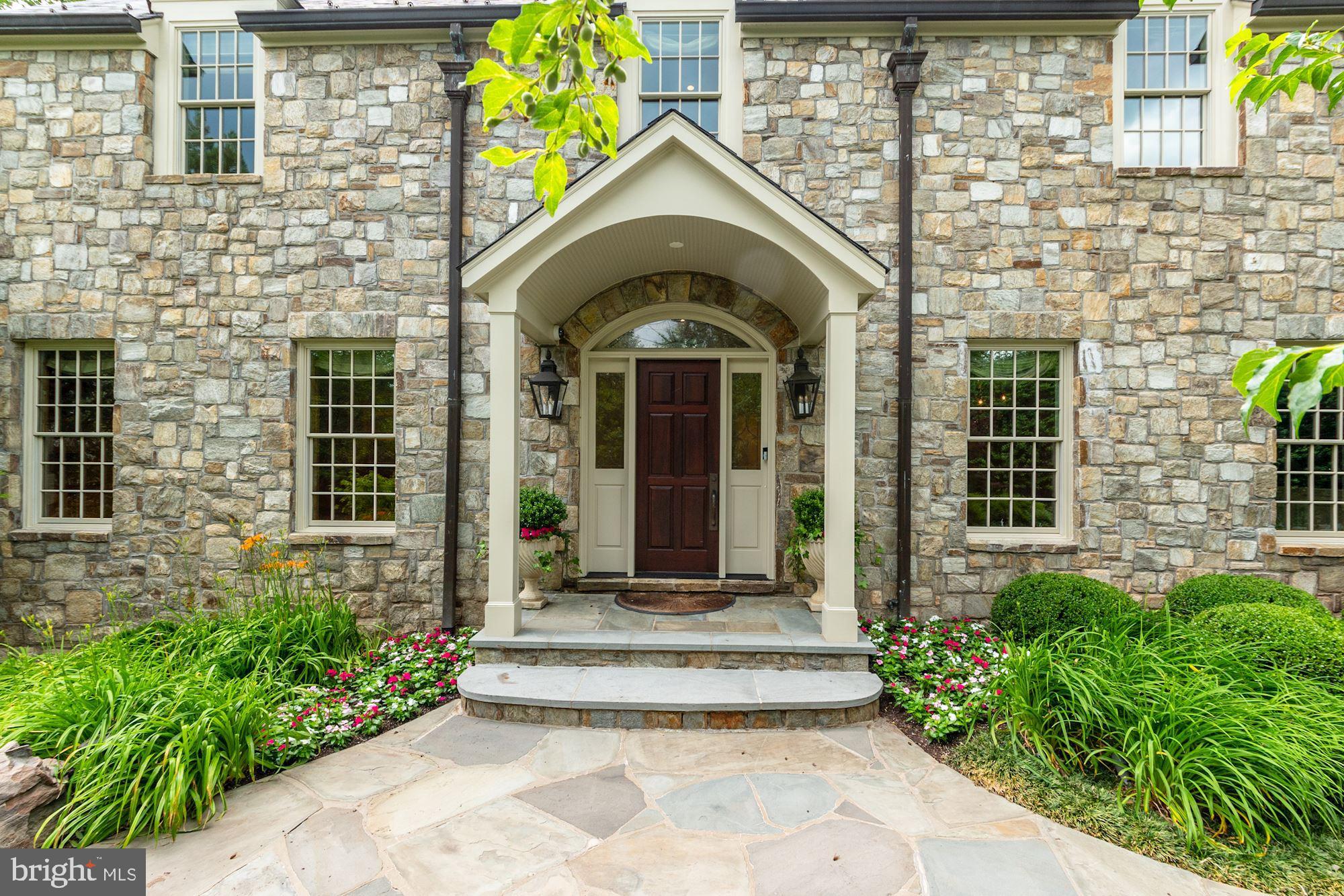 1107 Harvey Road McLean, VA 22101 - Photo 2 of 47 a view of a house with potted plants