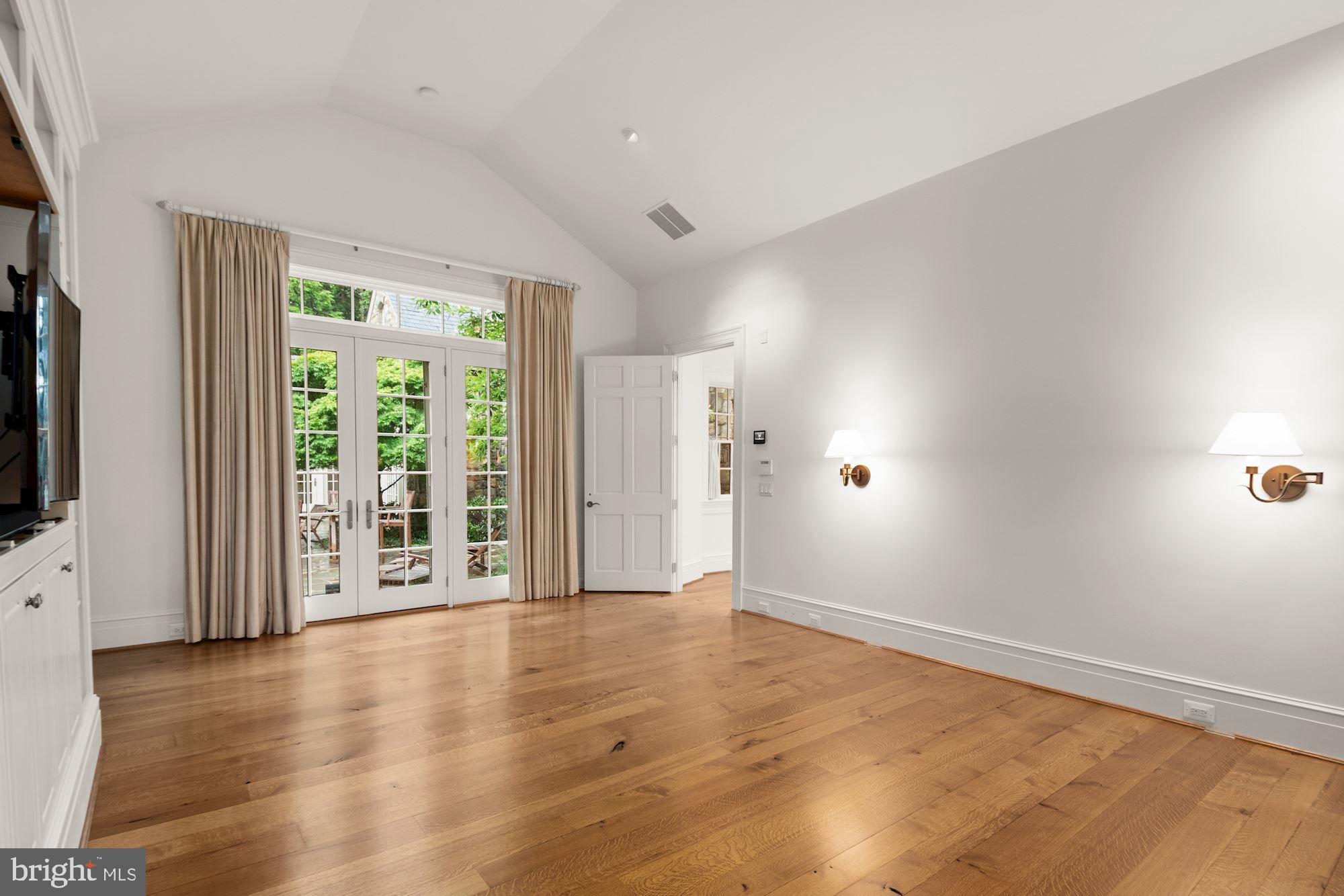 1107 Harvey Road McLean, VA 22101 - Photo 20 of 47 a view of an empty room with glass door