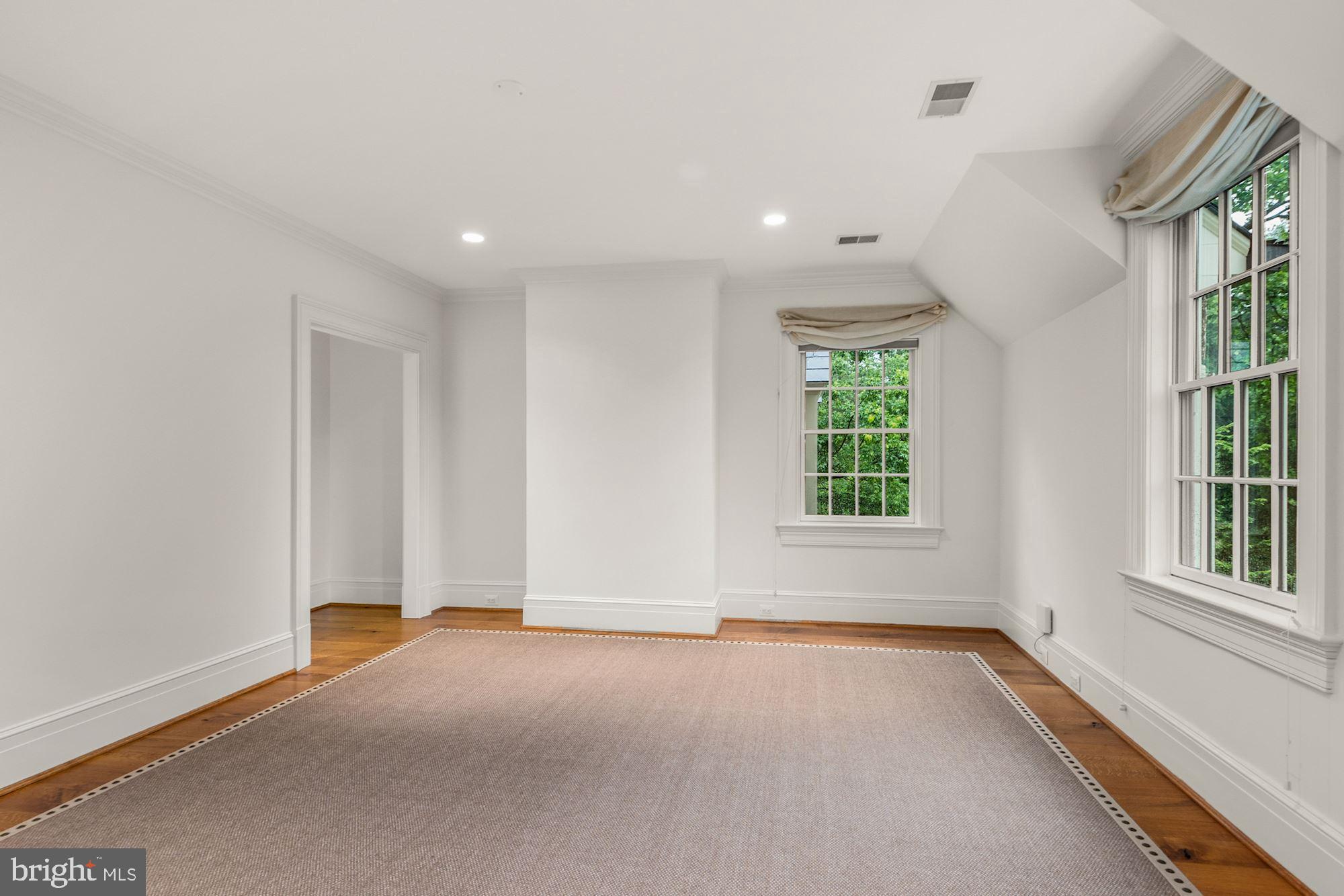 1107 Harvey Road McLean, VA 22101 - Photo 30 of 47 a view of an empty room with a window