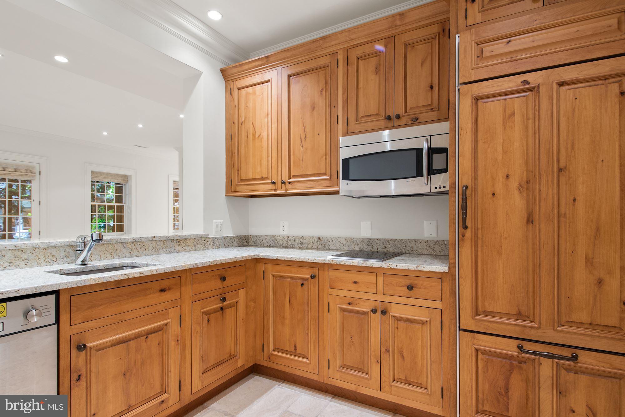 1107 Harvey Road McLean, VA 22101 - Photo 37 of 47 a kitchen with appliances cabinets and a sink