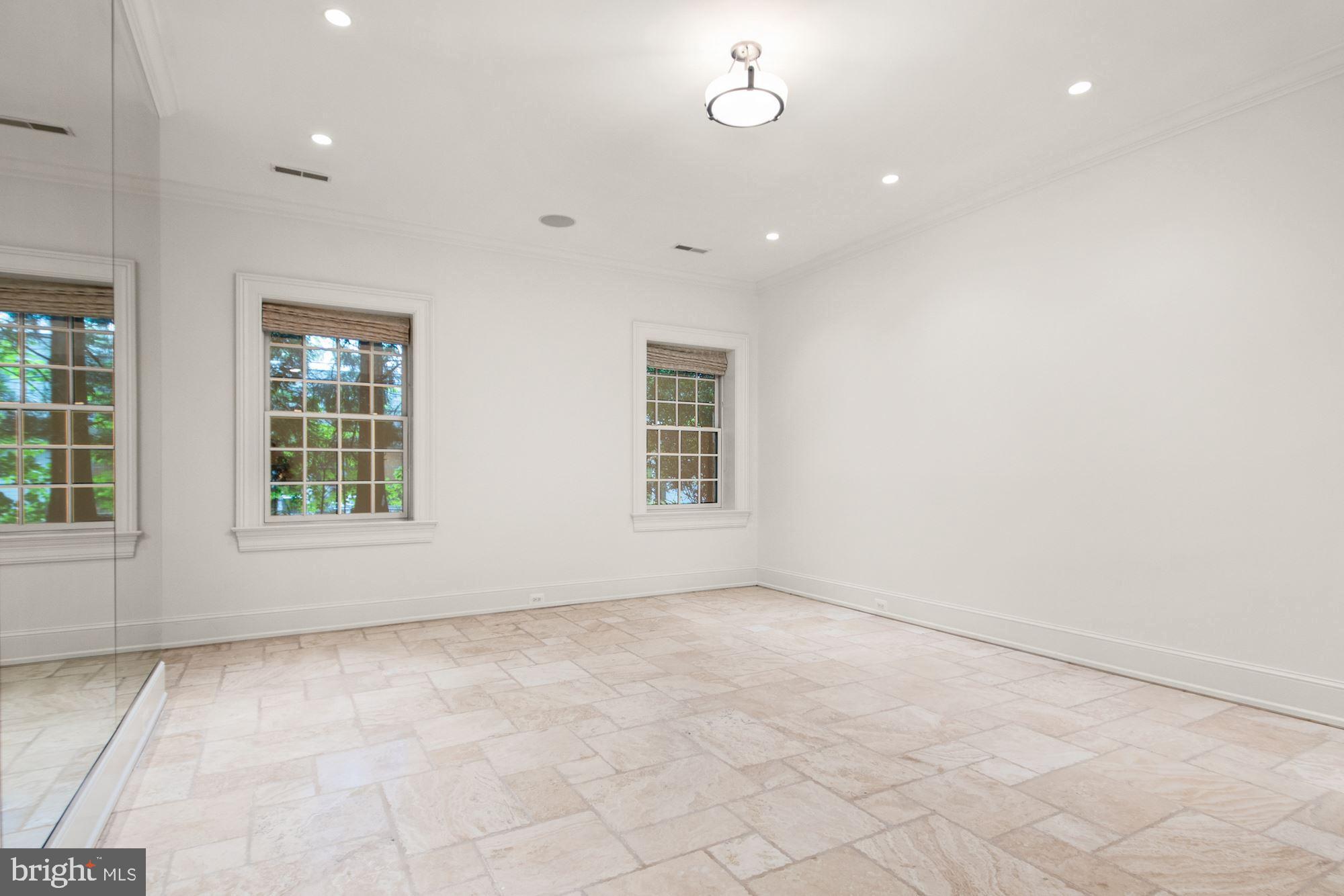 1107 Harvey Road McLean, VA 22101 - Photo 39 of 47 an empty room with windows