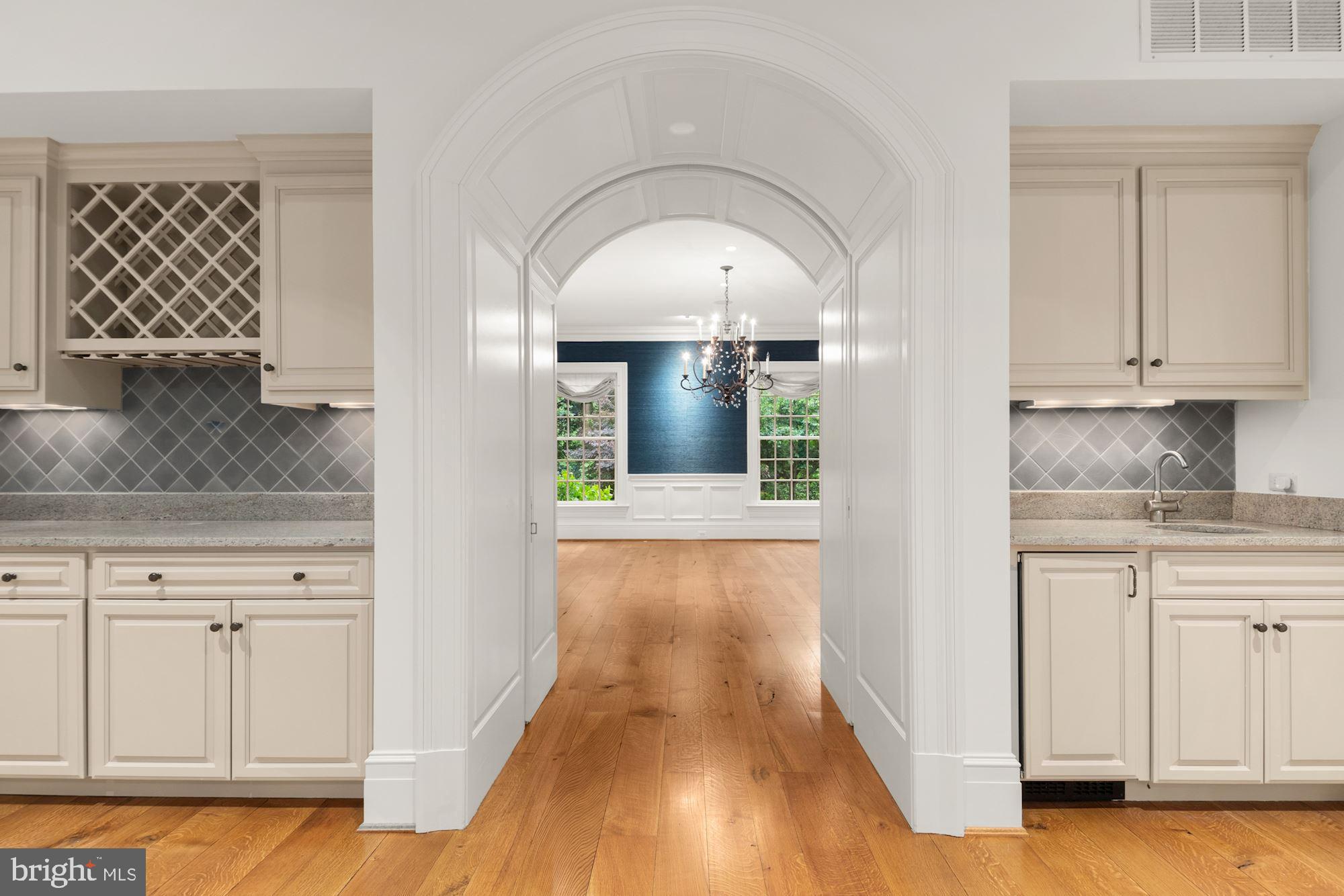 1107 Harvey Road McLean, VA 22101 - Photo 7 of 47 a view of a kitchen with wooden floor and cabinet