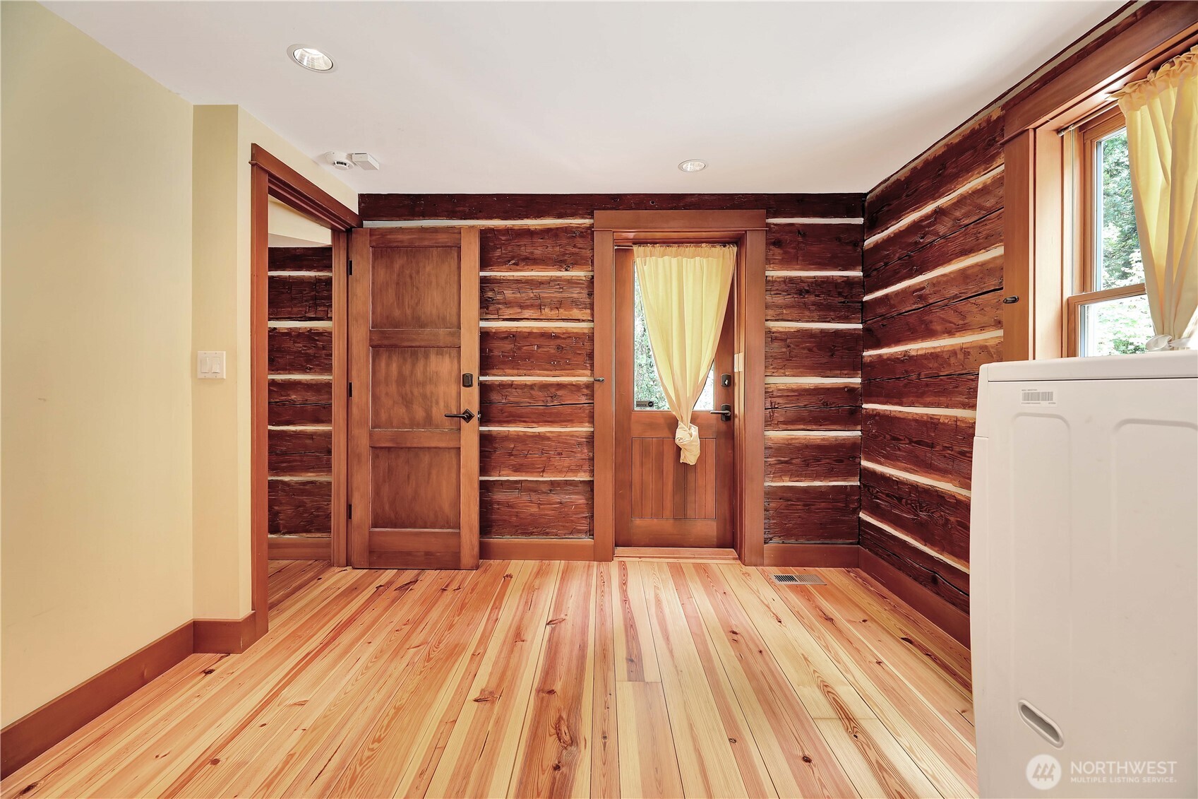 20226 Duvall Monroe Road Northeast Duvall, WA 98019 - Photo 22 of 38 a view of walk in closet with empty racks