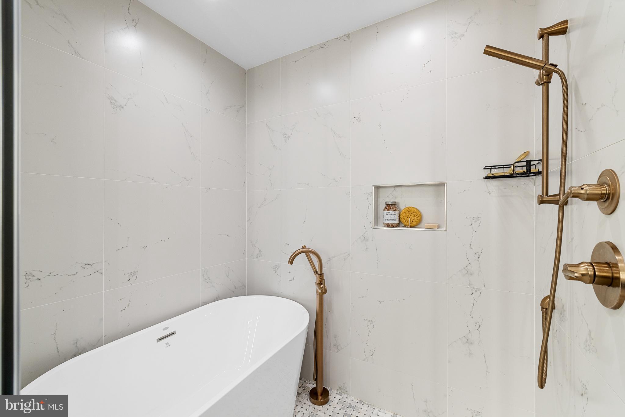 262 South 16th Street, Unit 7 Philadelphia, PA 19102 - Photo 23 of 36 a bathroom with a shower