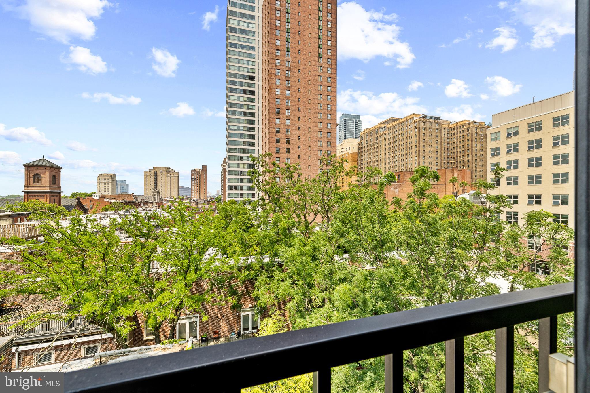 262 South 16th Street, Unit 7 Philadelphia, PA 19102 - Photo 25 of 36 a view of a city with tall buildings