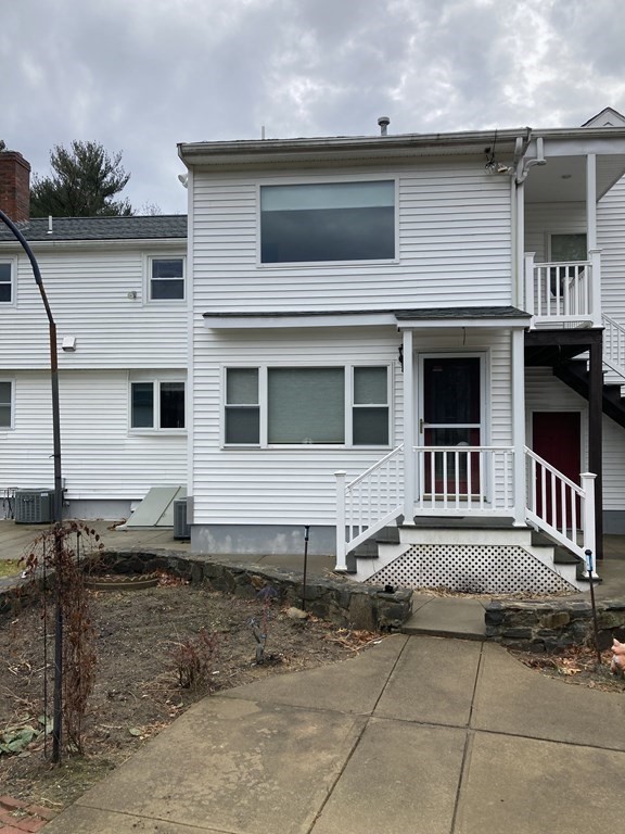 340 Salem Road, Unit 340 Billerica, MA 01821 - Photo 3 of 39 a front view of a house with a yard