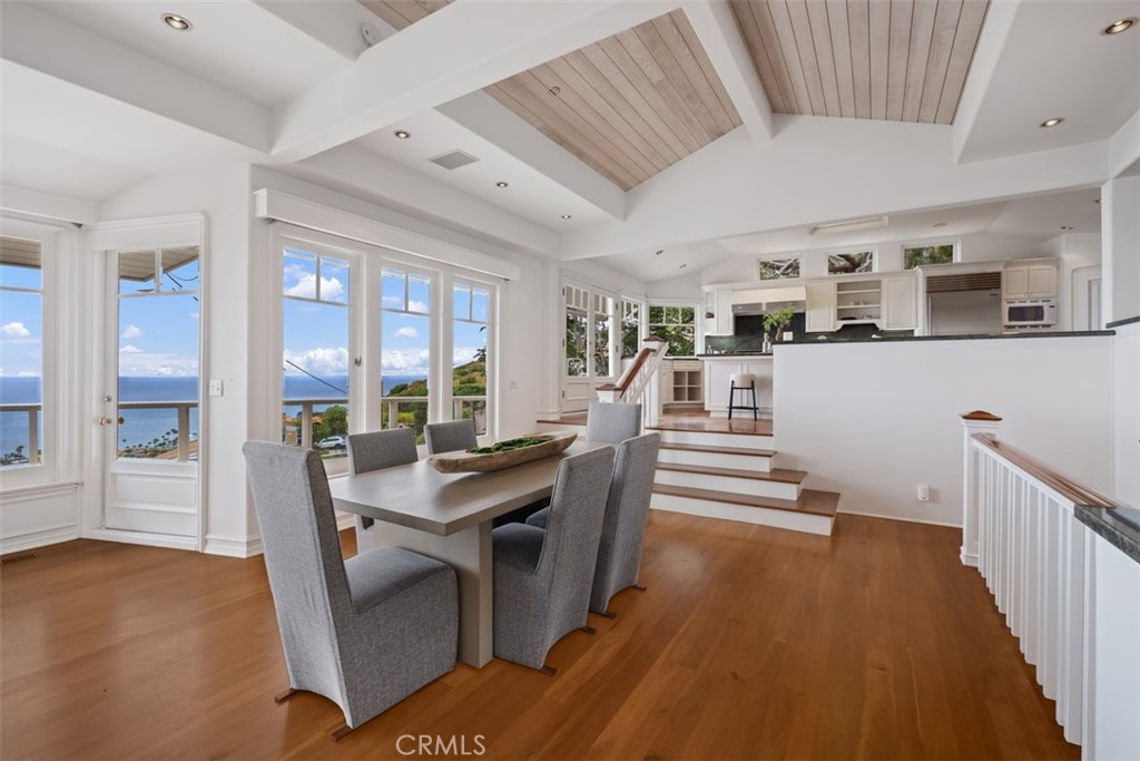 1201 Emerald Bay Laguna Beach, CA 92651 - Photo 14 of 47 a view of a dining room with furniture window and wooden floor