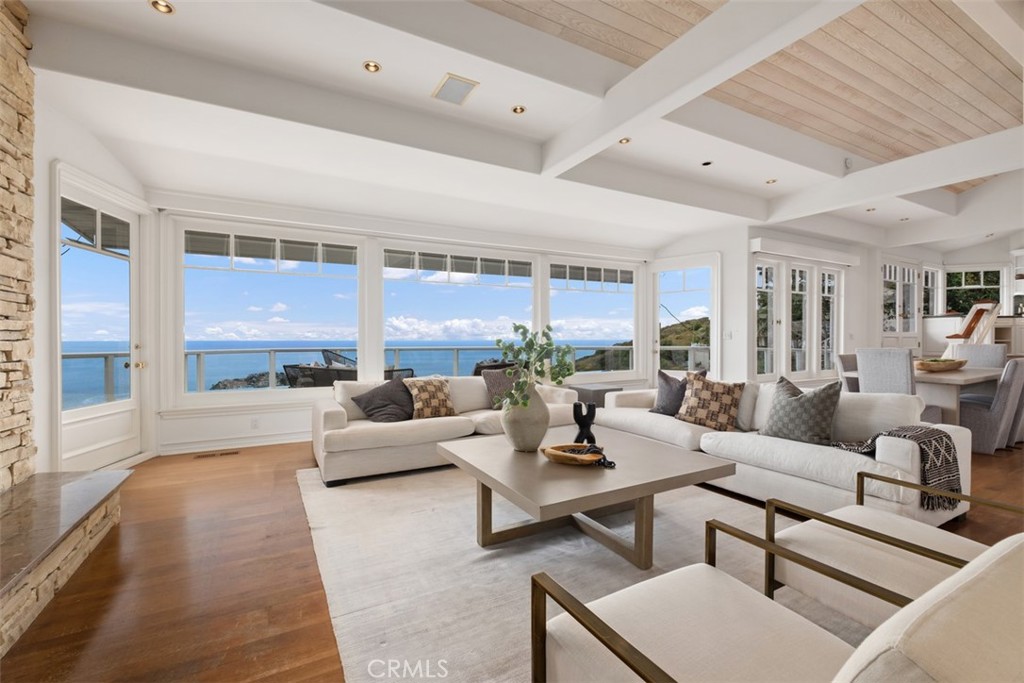 1201 Emerald Bay Laguna Beach, CA 92651 - Photo 2 of 47 a living room with furniture and a large window