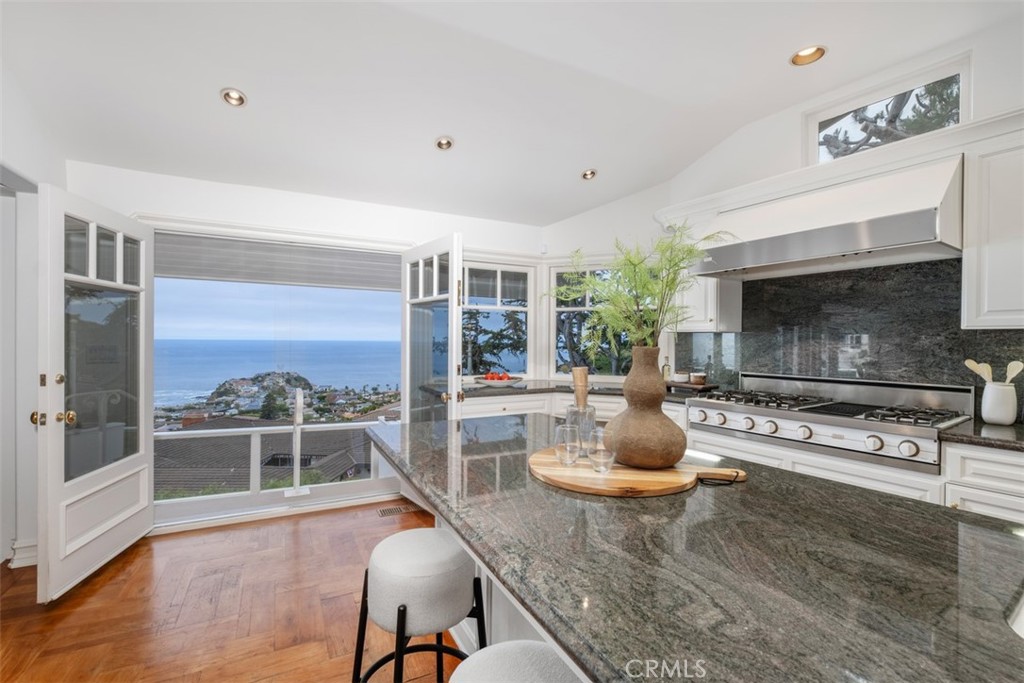1201 Emerald Bay Laguna Beach, CA 92651 - Photo 21 of 47 a living room with furniture and a fireplace