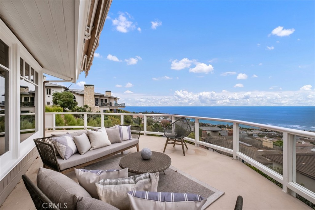 1201 Emerald Bay Laguna Beach, CA 92651 - Photo 23 of 47 a balcony with furniture and city view