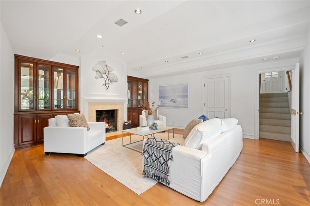 1201 Emerald Bay Laguna Beach, CA 92651 - Photo 36 of 47 a living room with furniture and a fireplace