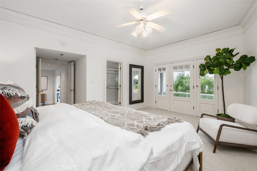 1201 Emerald Bay Laguna Beach, CA 92651 - Photo 43 of 47 a bedroom with bed and a large window