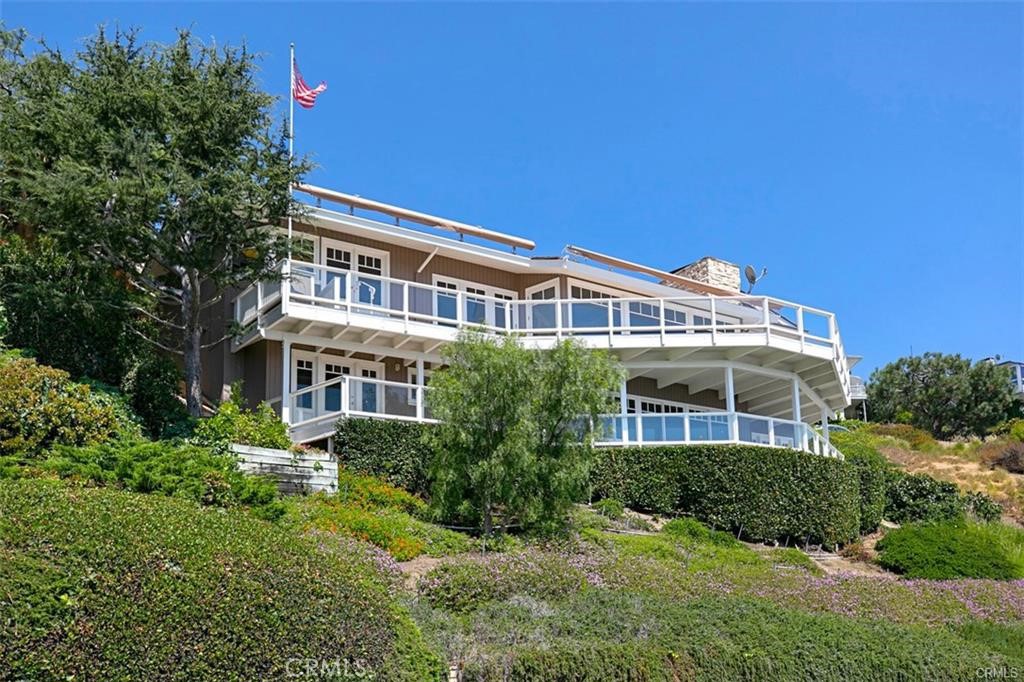 1201 Emerald Bay Laguna Beach, CA 92651 - Photo 6 of 47 a front view of a house with a yard