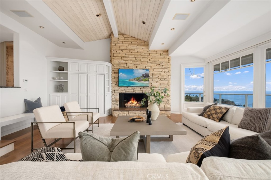 1201 Emerald Bay Laguna Beach, CA 92651 - Photo 10 of 47 a living room with furniture and a fireplace