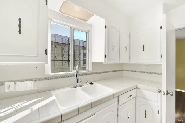 a bathroom with a sink and a bathtub