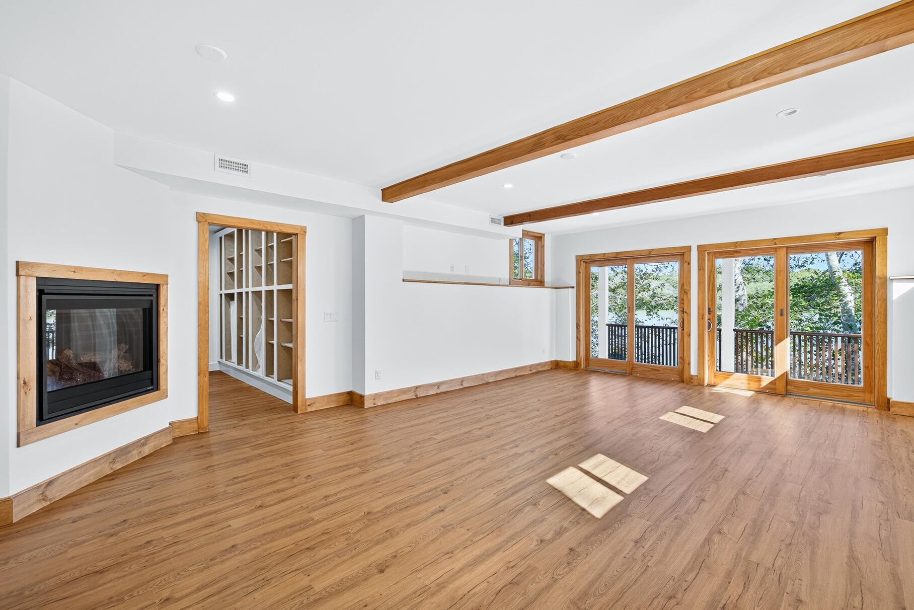 131 Timberlane Drive Mashpee, MA 02649 - Photo 41 of 57 a view of empty room with wooden floor and fireplace