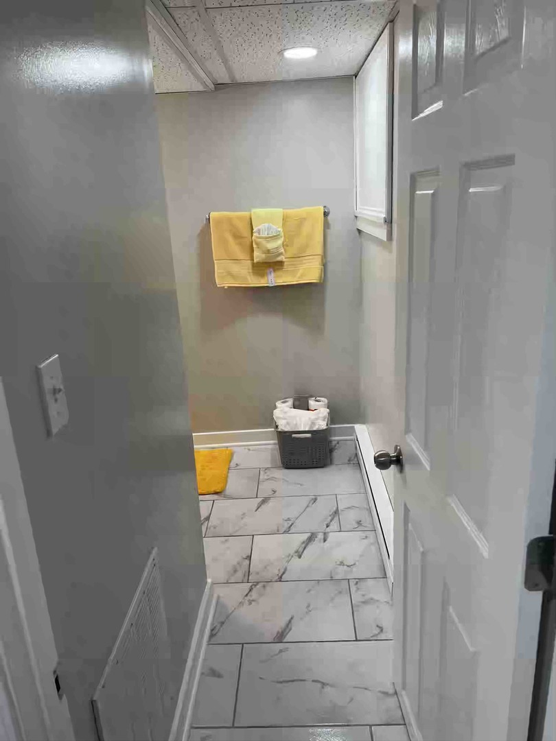 10434 South Wentworth Avenue, Unit GARDEN Chicago, IL 60628 - Photo 11 of 14 a bathroom with a sink and a mirror