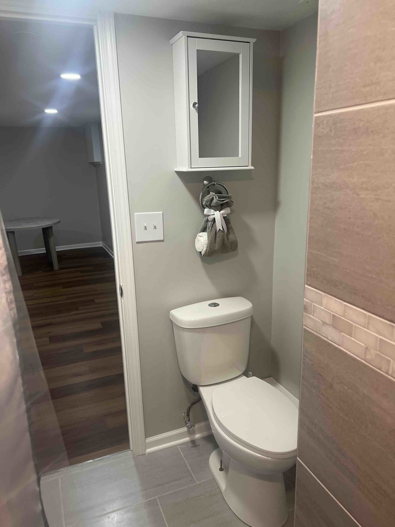 10434 South Wentworth Avenue, Unit GARDEN Chicago, IL 60628 - Photo 7 of 14 a bathroom with a toilet and a sink