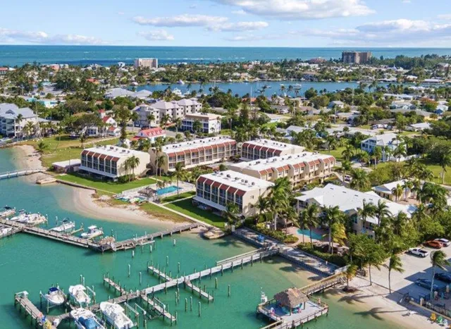 a city street lined with buildings and cars